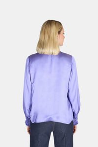 Blusa collo alto raso