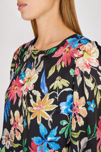 Blusa fantasia floreale multicolor con bottoncino sul retro