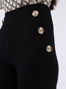 Pantalone finte tasche con bottoni