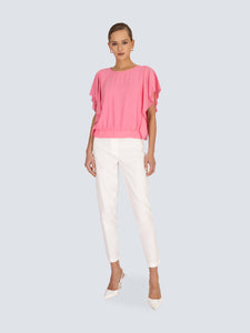 Blusa con fiocco su fondo posteriore