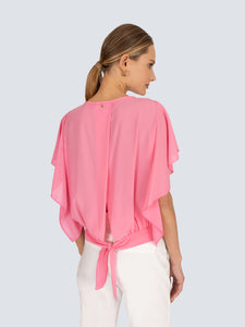 Blusa con fiocco su fondo posteriore