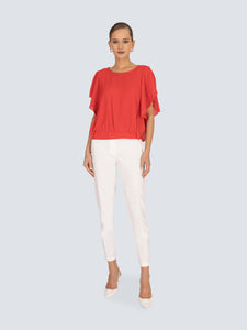 Blusa con fiocco su fondo posteriore