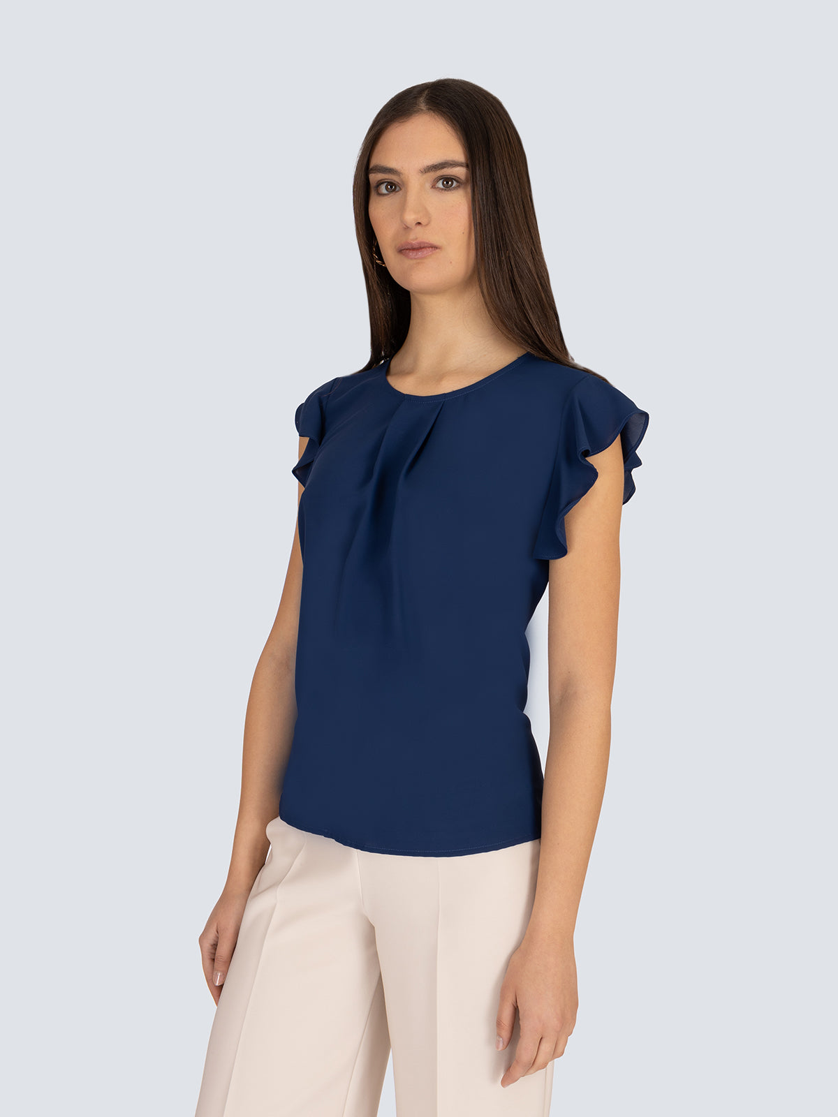 Top girocollo con manica volant